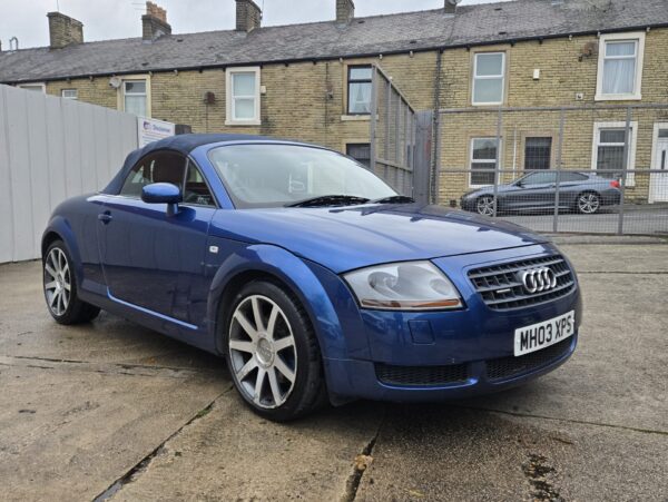 2003 Audi TT Quattro Convertible in blue with alloy wheels, leather seats, and a fully functional convertible roof, available for sale in Accrington